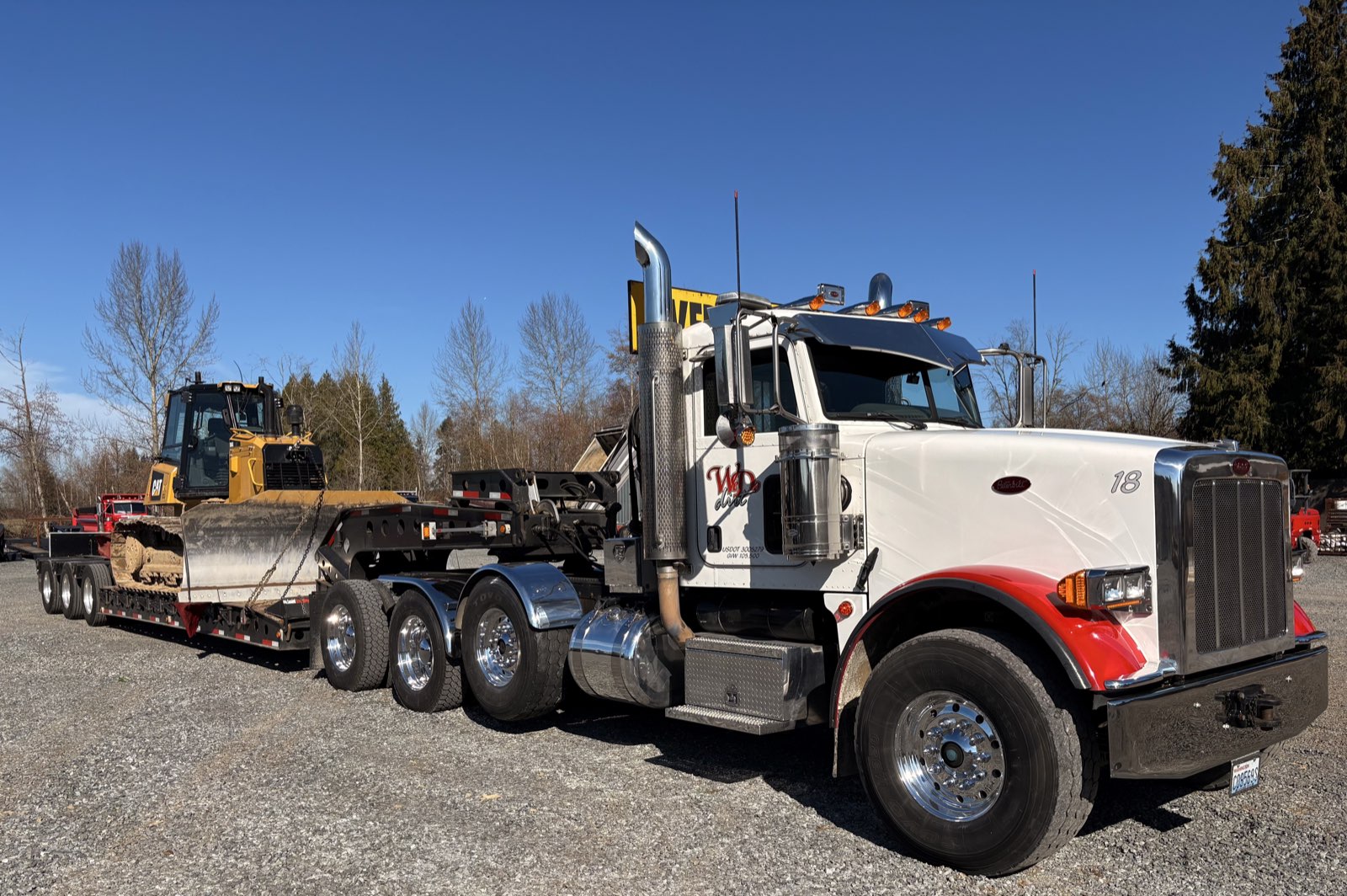 WD Dirt Peterbilt with CAT bulldozer on lowboy trailer